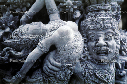The Agony and the Magic of relationship, Man's struggle with Female, statue, statuary, Bali, Island of Bali