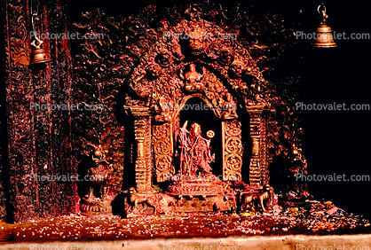 Goddess at Hindu temple, Bells, Durbar Square, Bhaktapur