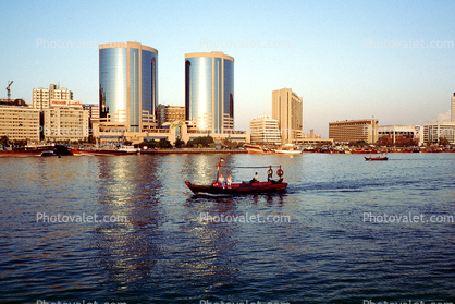 Deira Twin Towers, Dubai Creek, Waterfront, shoreline, buildings, boat, UAE, United Arab Emirates