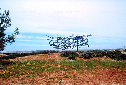 'Torah', Memorial to the Victims of the Concentration and Extermination Camps, Nandor Glid (1924-1997), cast bronze sculpture by Marcelle Swergold, Yad Vashem