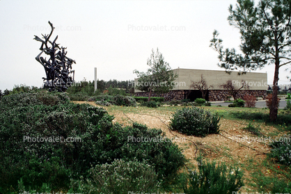 'Torah', Memorial to the Victims of the Concentration and Extermination Camps, Nandor Glid (1924-1997), cast bronze sculpture by Marcelle Swergold, Yad Vashem