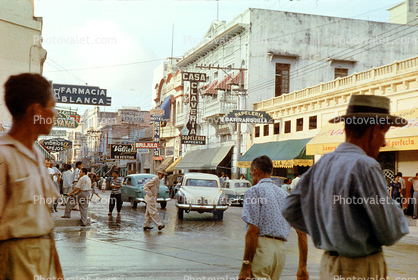 Casa Claveria, downtown, cars, buildings, city, shops, stores, hat, Studebaker, Cartagena, 1950s