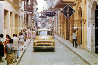 Casa Tovar, downtown, cars, buildings, city, shops, store signs, Ford Pickup Truck, Cartagena, 1950s