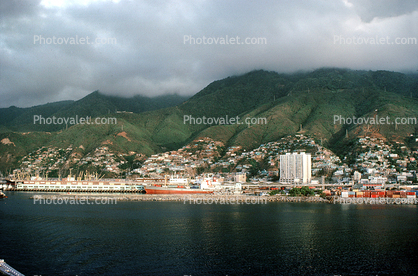 Docks, harbor, hillside, homes, waterfront, buildings, hills, mountains, city, La Guaira, Maiquetia, Venezuela