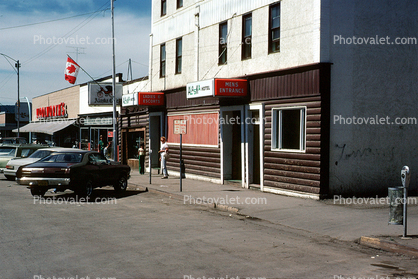 cars, Alaska Hotel, Woolworths, store, building, Dawson City, 1960s