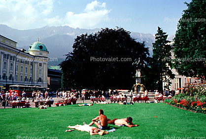 Innsbruck, men sunning, statue, park, Alps