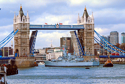 HMS Belfast (C35), Royal Navy light cruiser, Tugboat, Tower Bridge, London, River Thames