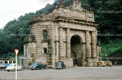 arch, landmark, woody, car, vehicle, automobile