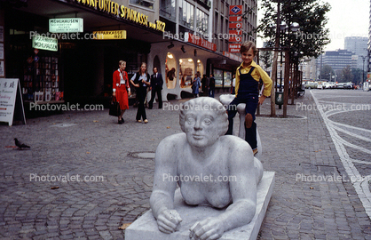 stores, cobblestone sidewalk, Berlin, October 1978, 1970s