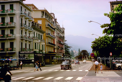 Stresa, cars, automobiles, vehicles, street, buildings, 1950s