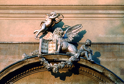 Flying Cherub and Winged Lions, Book, wreath, sculpture,, San Marco Church.