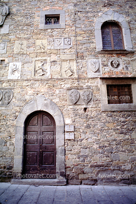 Wall, door, doorway, shields, brick wall, stone, Cortona, Arezzo, Tuscany, Italy