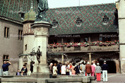 Tourists in a Courtyard, Building, Roof, Water Fountain