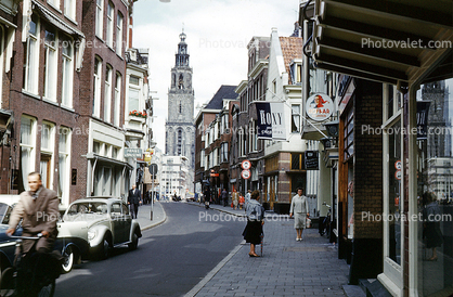 Tower, Volkswagen Beetle, sidewalk, street, buildings, shops, stores, Groningen, September 1959, 1950s
