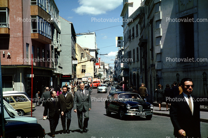 Cars, street, buildings, businessmen walking, April 1967, 1960s