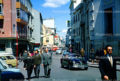 Cars, street, buildings, businessmen walking, April 1967, 1960s