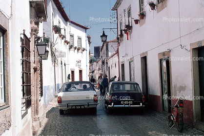 Cars, Stingray Bicycle, narrow cobblestone street, Spain, July 1974, 1970s