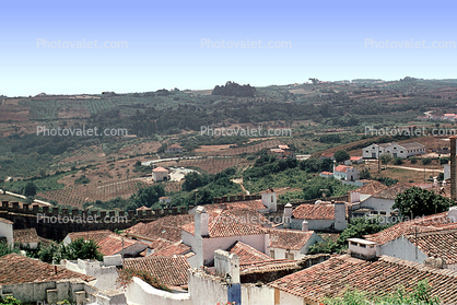 Buildings, hilltop, red rooftops, wall, July 1974
