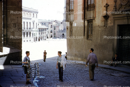 Cobblestone Street, buildings, men, walking, 1940s