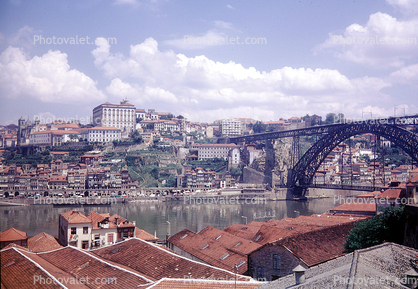 Dom Luis I Bridge, double-decked metal arch bridge, red roofs, skyline, buildings, Douro River, Porto