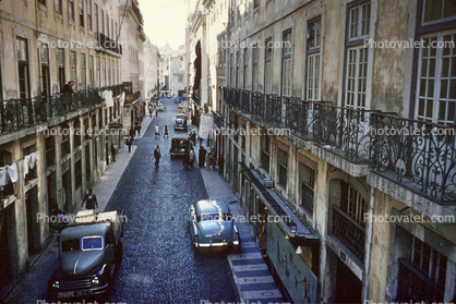 Coblestone Street, cars, buildings, balcony, automobile, vehicles, delivery truck, 1950s