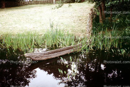Dugout canoe, water, shore