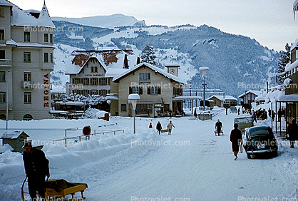 Street Scene, Sled, Cars, Homes, Buildings, Grindelwald, Switzerland, 1950s