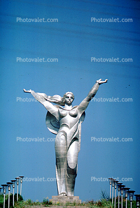 Female Steel Monument, sculpture, memorial, outstretched arms, woman, robe