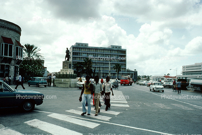 People Crossing on a Crosswalk, Street, Cars, Statue, Buildings, Saint George's