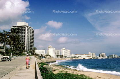 Beach, coastline, car, woman walking, Buildings