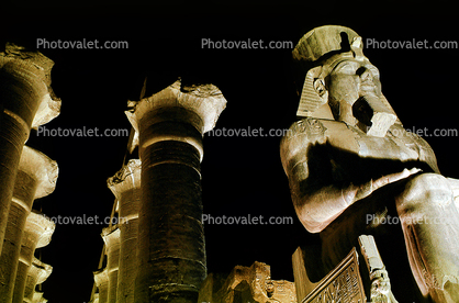 nighttime, Sitting Ramesses II Colossus inside Luxor Temple