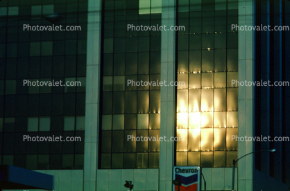 Sunset reflection, glass, building, chevron
