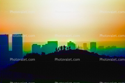 sunset, skyline, smog, haze, buildings, hill, people