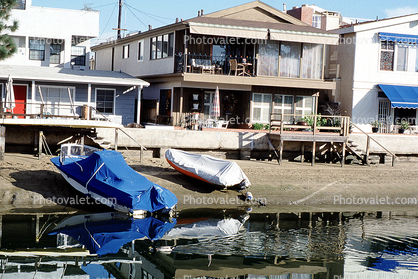 Marina, boats, water reflection, homes, houses, buildings