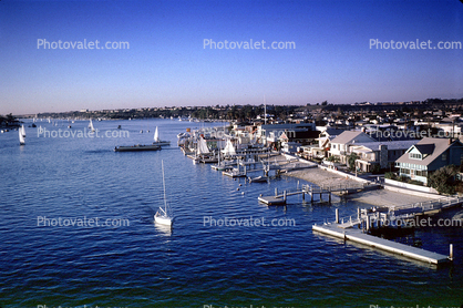 harbor, docks, boats, homes, waterfront, shoreline, piers, Newport Beach, December 1964, 1960s