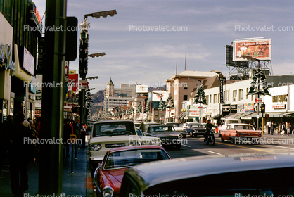 Cars, Hollywood Boulevard, crowded, shops, Corvair Van, 1960s