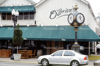 O'Brien's, outdoor clock, outside, exterior, building, roman numerals
