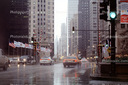 cars, automobiles, vehicles, rain, inclement weather, slick, downpour