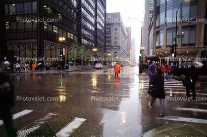 rain, inclement weather, slick, downpour, crosswalk, people