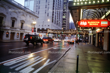 Chicago Theatre District, rain, inclement weather, slick, taxi, only arrow, sidewalk, buildings, awning, Cars, automobile, vehicles