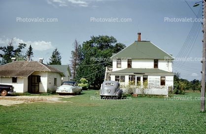 Homes, houses, rural, cars, 1950s