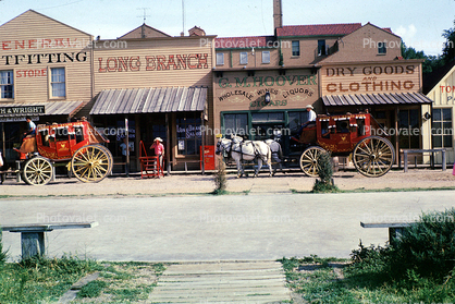 Buildings, shops, horses, stage coaches, purse, Dodge City, August 1963, 1960s