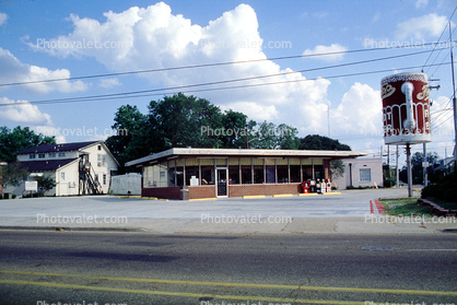 Root Beer diner, building, huge mug, cup, parking lot, clouds, Baton Rouge