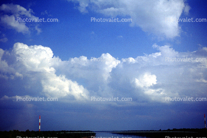 Atachafalaya River, pure sky, cumulus clouds