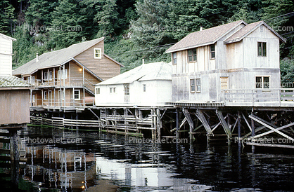 Pier, buildings on stilts, reflection, harbor, Ketchikan
