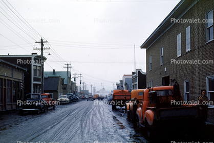 Downtown Valdez, cars, trucks, muddy road, pickup truck, buildings, rain, rainy, August 1952, 1950s