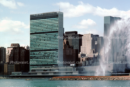 United Nations Building, Delacorte geyser fountain, skyline, clouds
