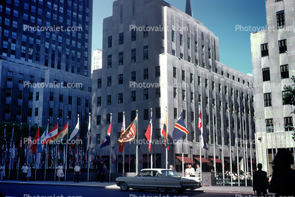 1961 Cadillac, buildings, flags, car, June 1964, 1960s