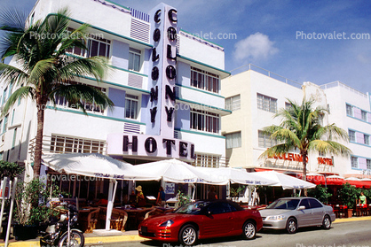 Colony Hotel, Art-deco building, cars, palm trees, awning