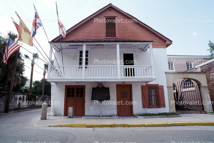 Tovar House, Curb, balcony, doors, sidewalk, flags, landmark